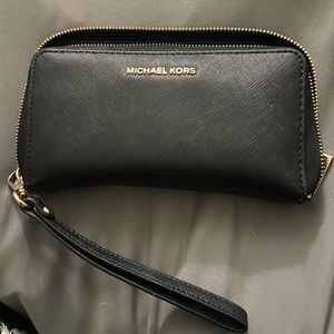 Michael kors clutch wallet.